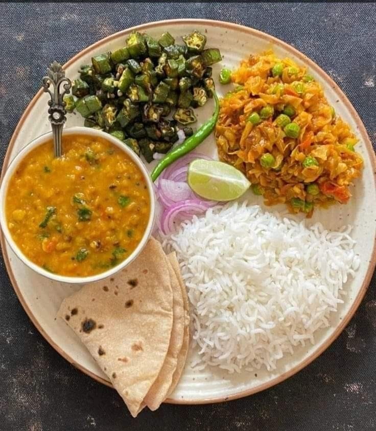 Lunch at Infinity Space PG near Christ University Yeshwanthpur — dal, rice, roti, bhindi and cabbage sabzi