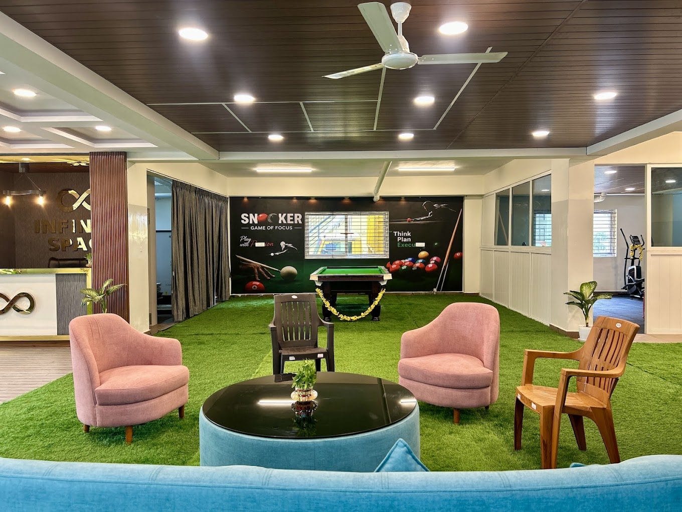 Common area with snooker table and lounge seating at Infinity Space PG, Yeshwanthpur