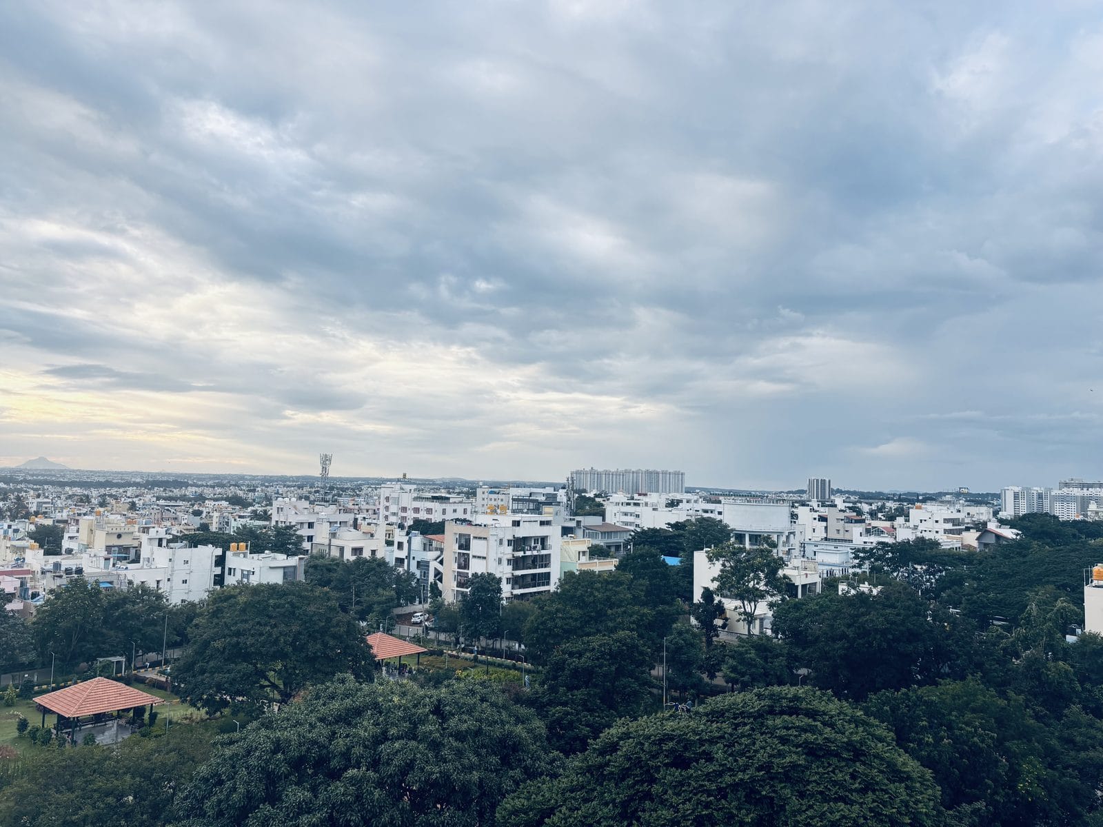 The view from the rooftop at Infinity Space PG, Yeshwanthpur, Bengaluru at dusk